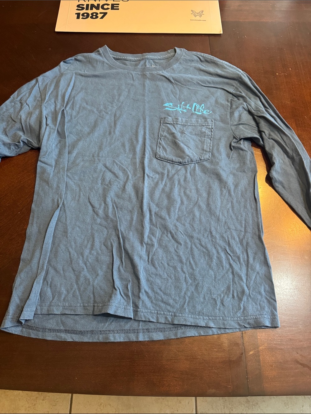 Salt Life Long Sleeve Pocket Tee in Slate Blue with Teal Logo